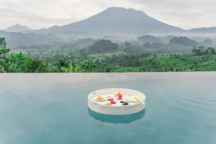 Floating breakfast tray in a calm pool